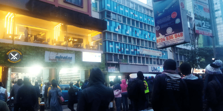 People Gathered At Nature Building In Nairobi Cbd To View The Body Of The Man Who Fell From 5Th Floor. Photo/ The Kenya Times.