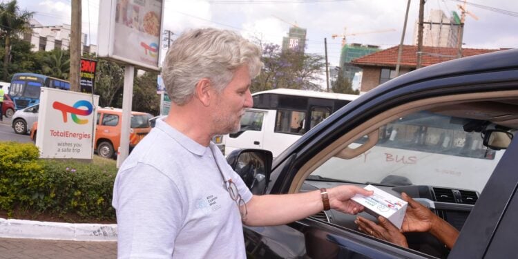 Companies And Businessmen Owning Totalenergies Fuel Stations In Kenya Totalenergies Kenya Managing Director Thibault Flichy Attends To A Customer During The Customer Service Week On October 6. Photo/Totalenergieskenya