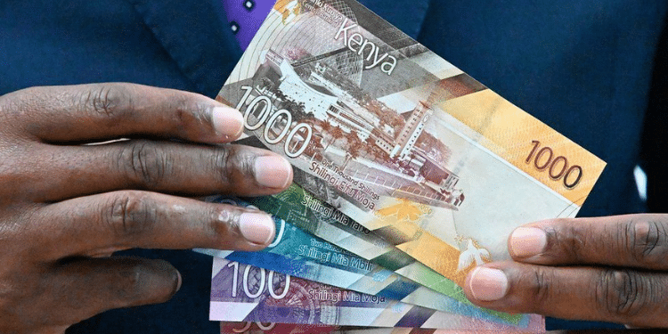 A Photo Of Someone Holding Kenyan Bank Notes. Photo/Cbk