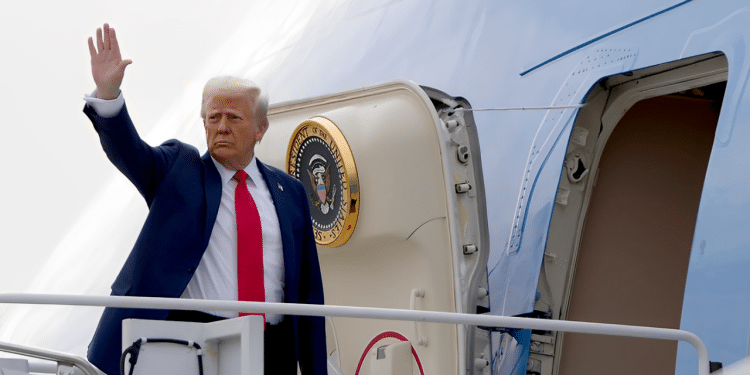 Us President Donald Trump Aboard The Air Force One.
