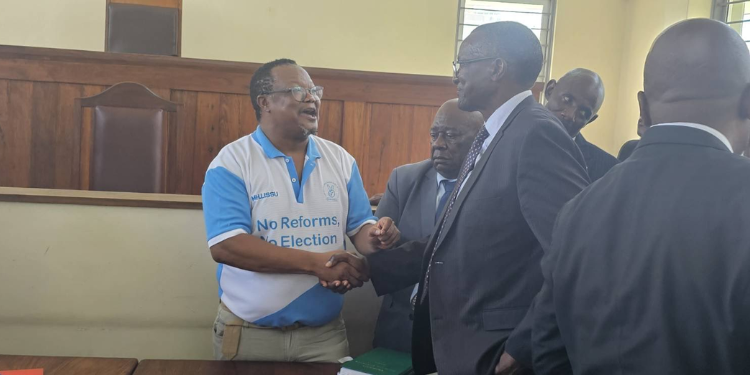Tanzania Govt Clarifies Blocking Opposition Leader From Travelling To Kenya Tanzania Opposition Politician Godbless Lema With Kenya’s Former Chief Justice David Maraga During A Past Court Appearance. Photo/Lema X.