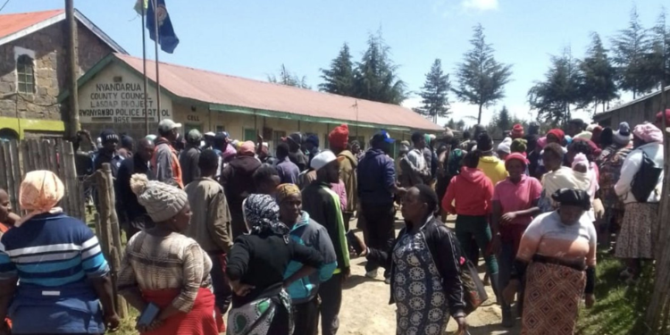 Cop Suspended After Pregnant Woman Miscarried At A Police Cell Residents Gathered At Rwanyambo Police Post, Nyandarua County After A Woman Miscarried While In Custody. Photo/Ntv.