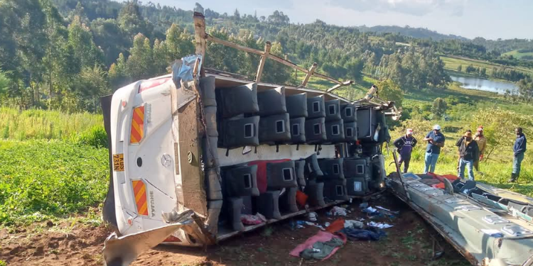 Wreckage Of The Tour Bus Lies Overturned In A Field Along The Dundori–Ol Jororok Road In Gichaka, Nyandarua County, After A Tragic Accident Involving Tourists. Photo/Miano X.