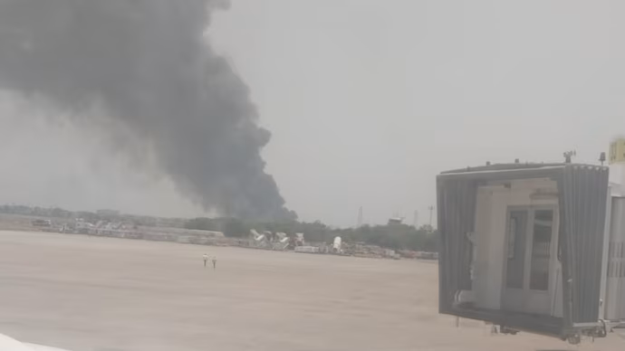 Air India Plane With 242 On Board Crashes In Ahmedabad Smoke Fills The Air After The Plane Crashed Near Ahmedabad Airport. Photo/ India Today