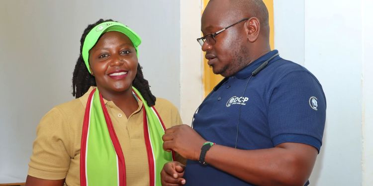 Democracy For Citizens Party (Dcp) National Youth Leader Wanjiku Thiga Speaking With Fellow Dcp Party Member. Photo/Wanjiku Thiga