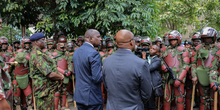 Interior Cs Kipchumba Murkomen, Ps Raymond Omollo And Ig Douglas Kanja Addressing Police Officers During A Past Meeting. Photo/Murkomen X.