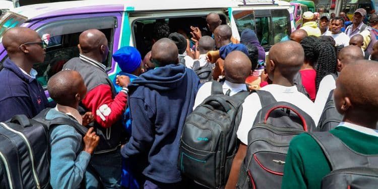 Students Scrambling For A Matatu.
