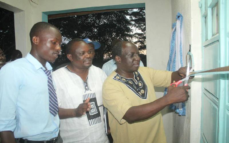 Siaya County Assembly Clerk Felix Olwero (Centre) With Seme Mp James Nyikal At A Past Function.