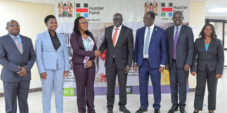 Henry Tanui Appointed New Hustler Fund Ceo New Hustler Fund Ceo Henry Tanui, Fourth From Left, Cooperative Cs Wickliffe Oparanya And Other Officials. Photo/ File