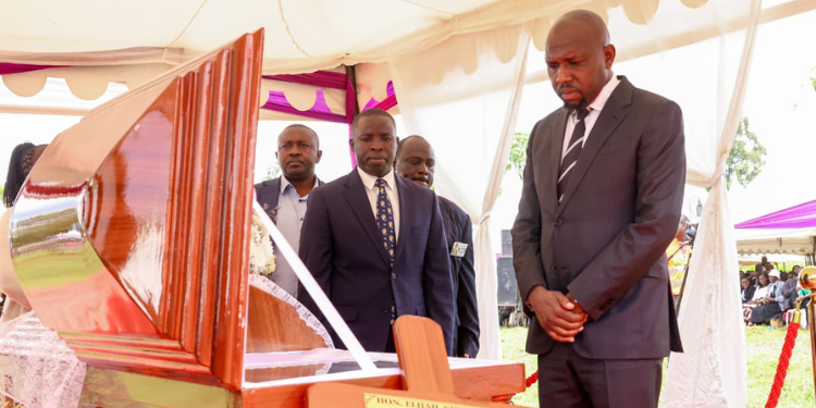 A Photo Of Murkomen Viewing Raila’s Body. Photo/ Murkomen
