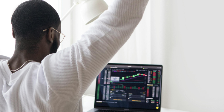 A Forex Trader Monitoring Trends. Photo-Handout