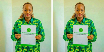 Jessica Magufuli Posing For A Photo With Ccm Card. Photo/Jessicafacebook